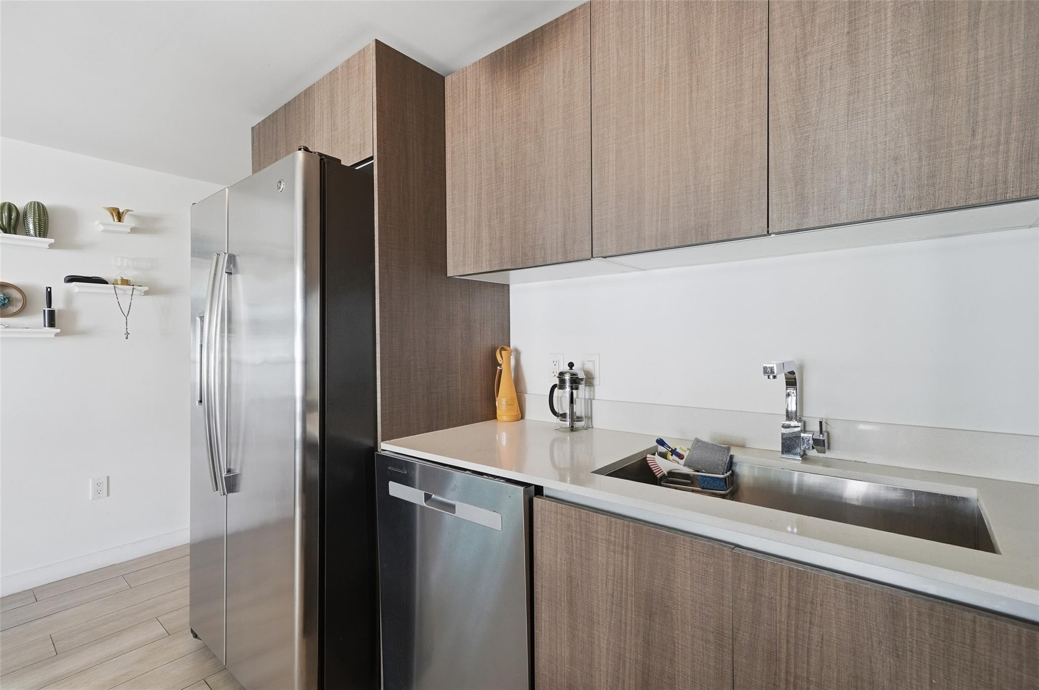 1600 Southwest 1st Avenue, Unit 510 Miami, FL 33129 - Photo 11 of 75 a kitchen with stainless steel appliances granite countertop a refrigerator and a sink