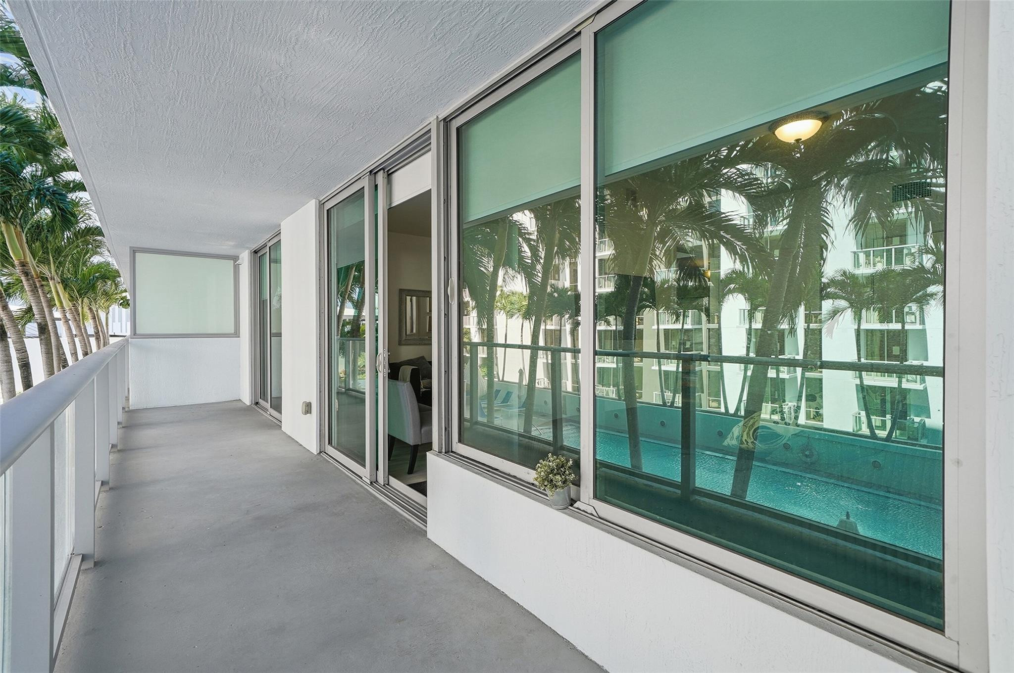1600 Southwest 1st Avenue, Unit 510 Miami, FL 33129 - Photo 31 of 75 a view of a glass door and yard from a window