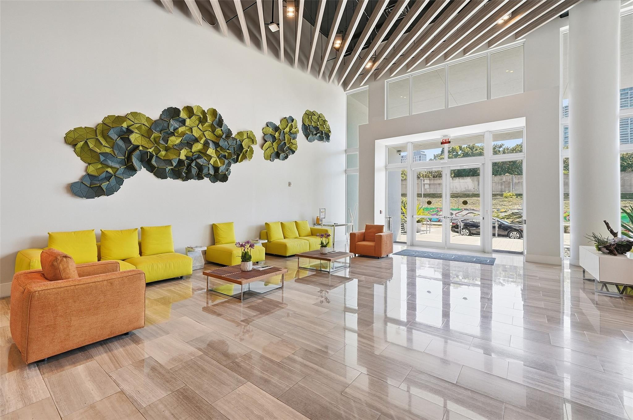 1600 Southwest 1st Avenue, Unit 510 Miami, FL 33129 - Photo 48 of 75 a living room with furniture and a wooden floor