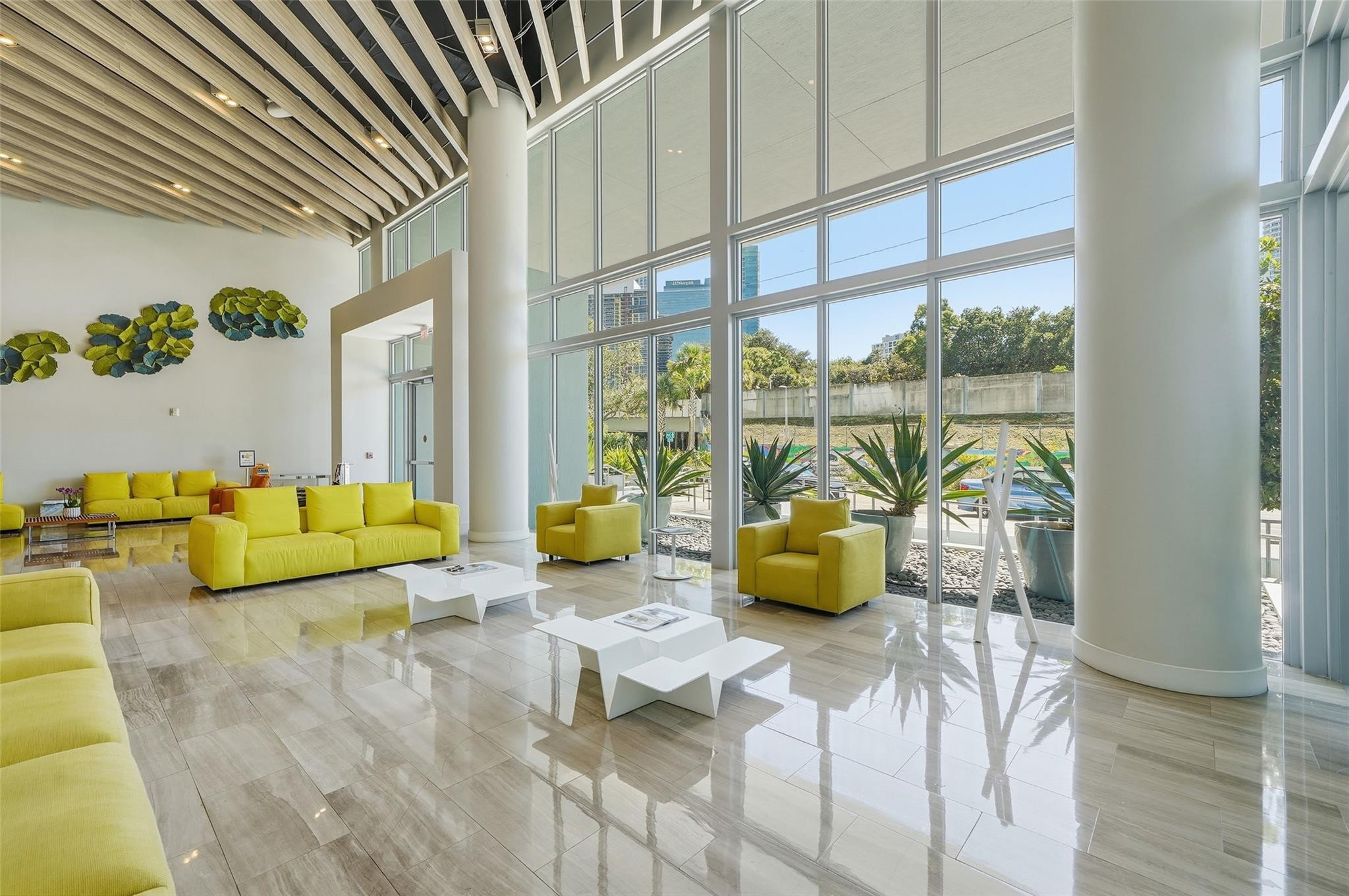 1600 Southwest 1st Avenue, Unit 510 Miami, FL 33129 - Photo 50 of 75 a bathroom with a tub and view of living room