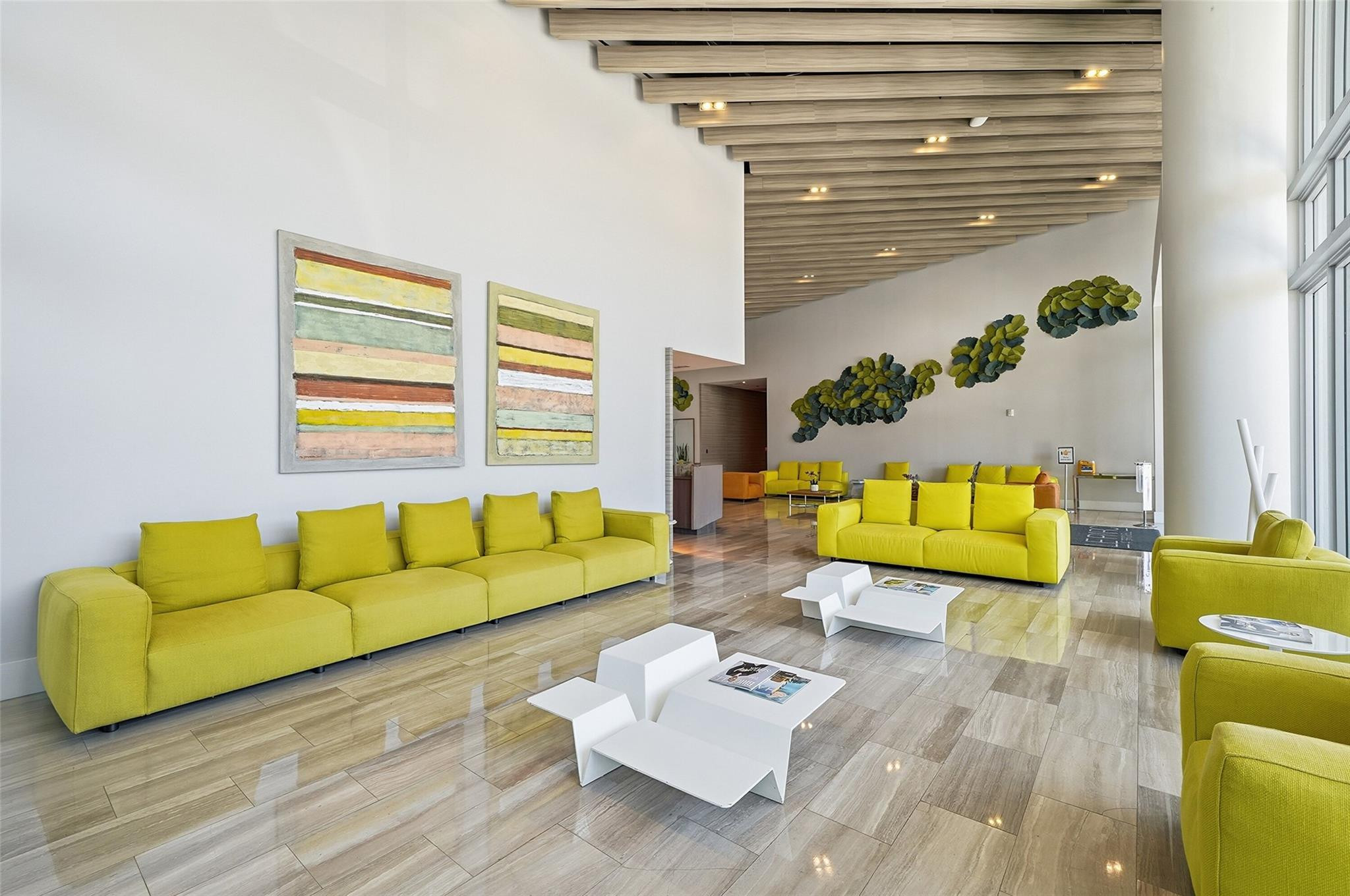 1600 Southwest 1st Avenue, Unit 510 Miami, FL 33129 - Photo 51 of 75 a living room with furniture and a wooden floor