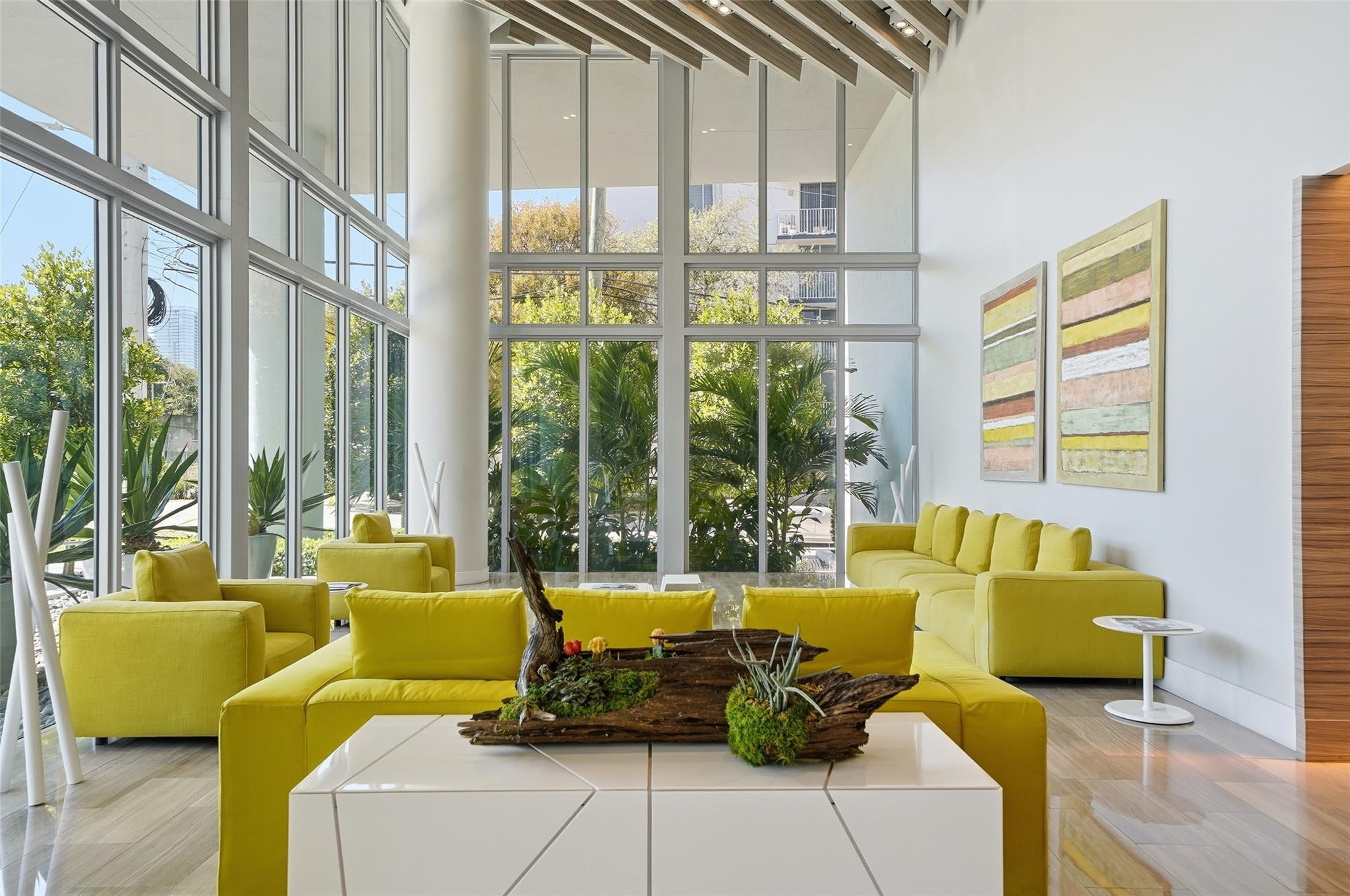 1600 Southwest 1st Avenue, Unit 510 Miami, FL 33129 - Photo 52 of 75 a living room with furniture and floor to ceiling windows