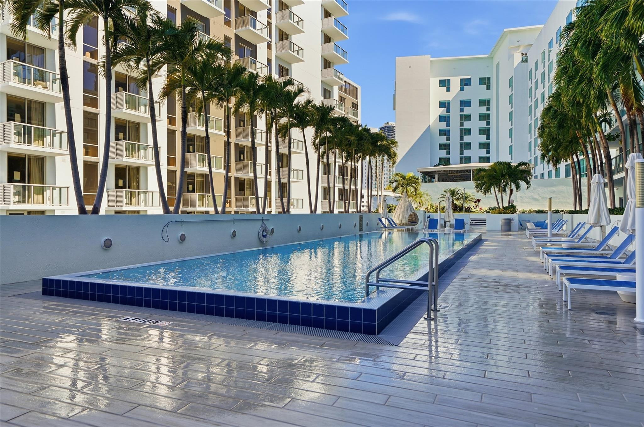 1600 Southwest 1st Avenue, Unit 510 Miami, FL 33129 - Photo 53 of 75 a view of swimming pool with outdoor seating and city view