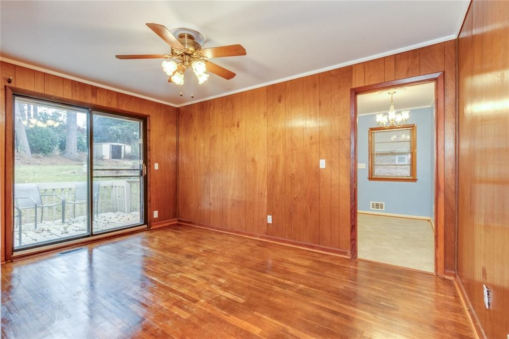 4424 Locksley Road Tucker, GA 30084 - Photo 24 of 50 wooden floor in an empty room with a window