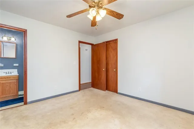 a bathroom with a toilet and a sink