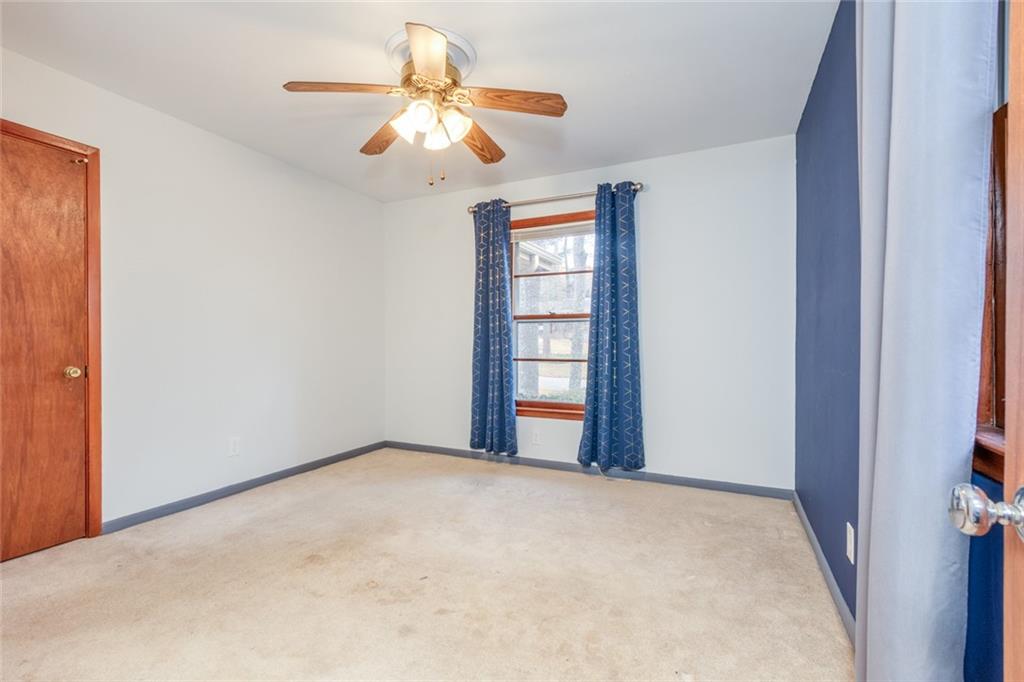4424 Locksley Road Tucker, GA 30084 - Photo 35 of 50 a view of an empty room with a window