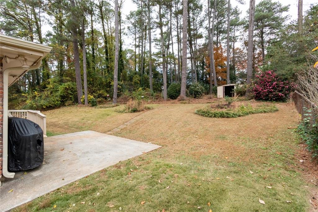 4424 Locksley Road Tucker, GA 30084 - Photo 38 of 50 a view of backyard with trees