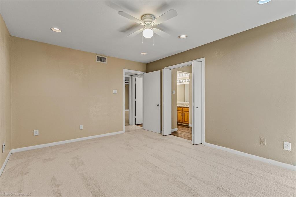 925 Signal Ridge Place Rockwall, TX 75032 - Photo 17 of 21 a view of an empty room with a window