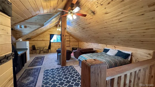 a view of balcony with furniture