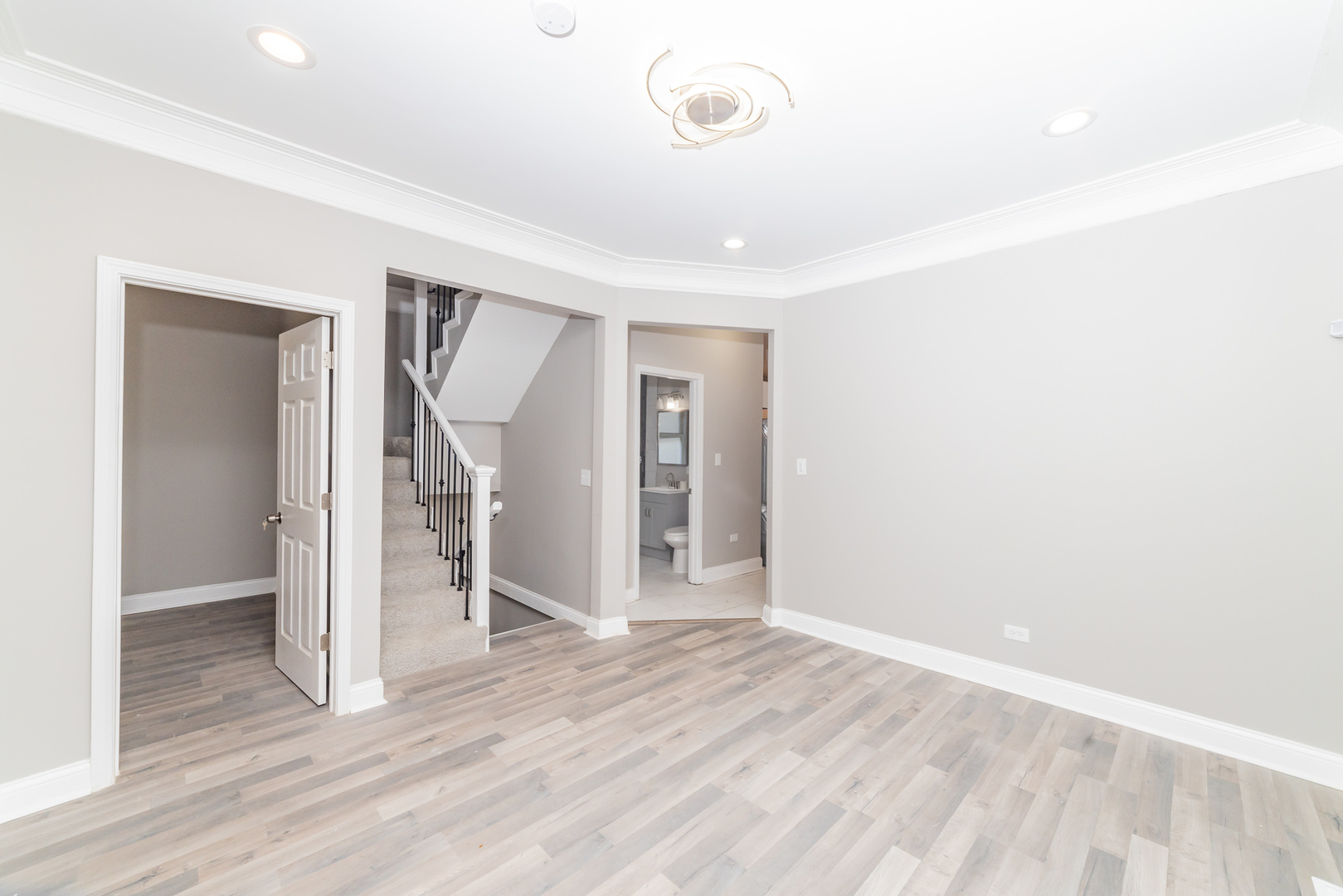 7227 South Indiana Avenue Chicago, IL 60619 - Photo 7 of 21 a view of empty room with wooden floor