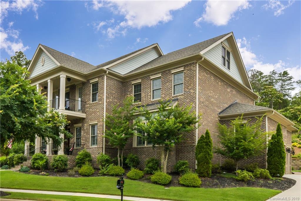 615 Pomegranate Place Fort Mill, SC 29708 - Photo 2 of 34 a front view of a house with garden