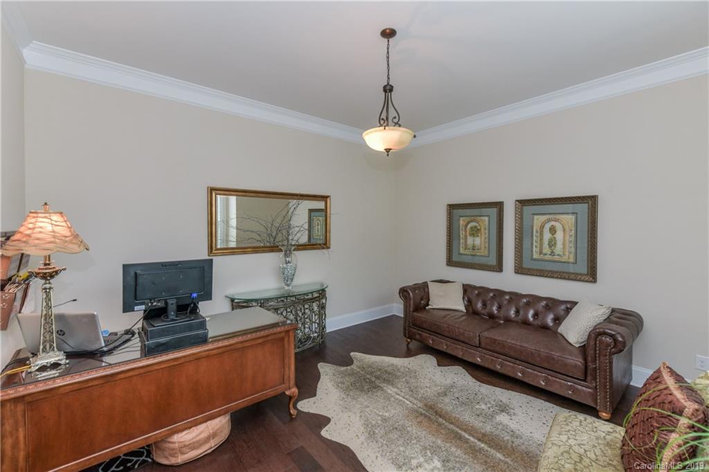 615 Pomegranate Place Fort Mill, SC 29708 - Photo 14 of 34 a living room with furniture and a wooden floor