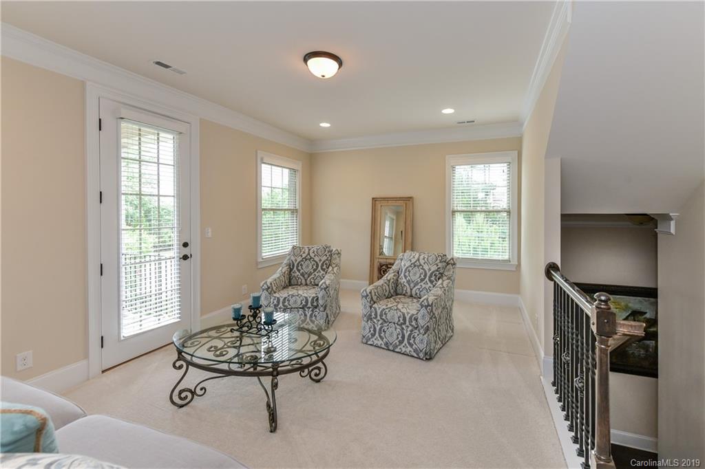 615 Pomegranate Place Fort Mill, SC 29708 - Photo 18 of 34 a living room with furniture and a flat screen tv
