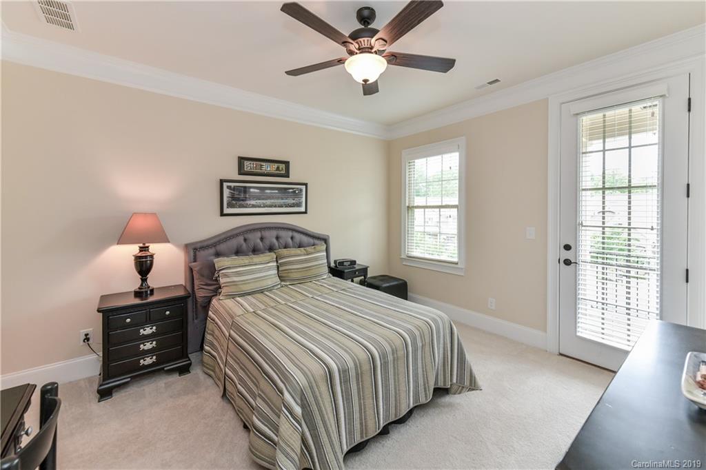 615 Pomegranate Place Fort Mill, SC 29708 - Photo 22 of 34 a bedroom with a bed and a window