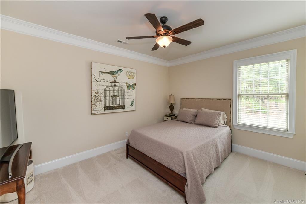 615 Pomegranate Place Fort Mill, SC 29708 - Photo 24 of 34 a bedroom with a bed and a window