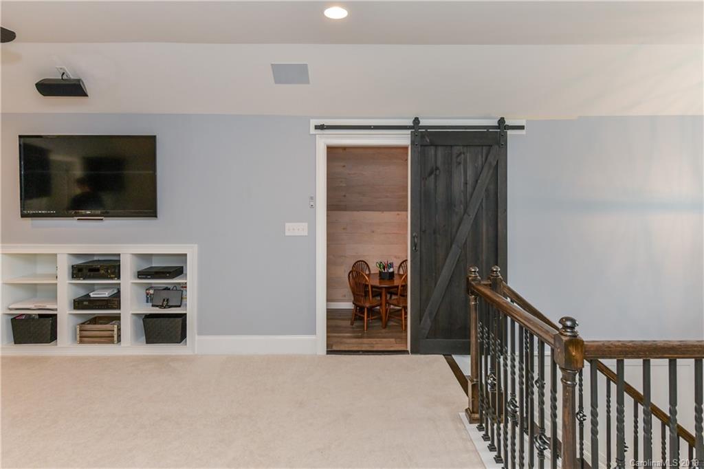 615 Pomegranate Place Fort Mill, SC 29708 - Photo 28 of 34 a view of a livingroom with a flat screen tv