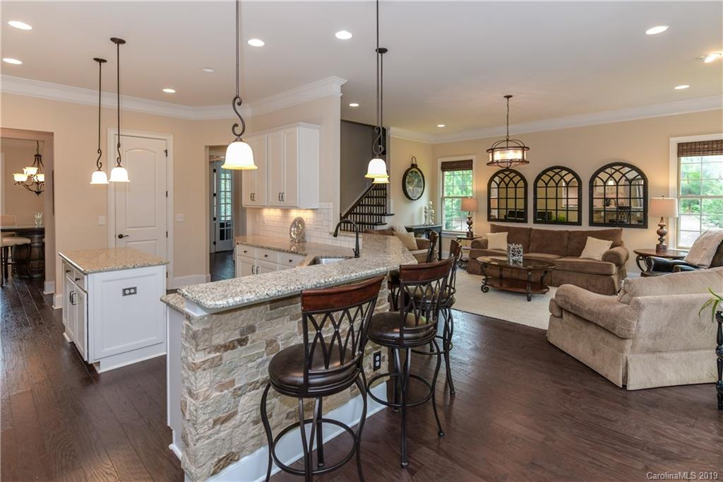 615 Pomegranate Place Fort Mill, SC 29708 - Photo 10 of 34 a large kitchen with a table and chairs