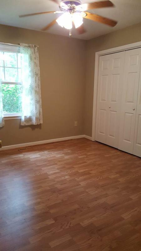 6700 Haw Patch Road Ferrum, VA 24088 - Photo 21 of 30 a view of room with window and wooden floor