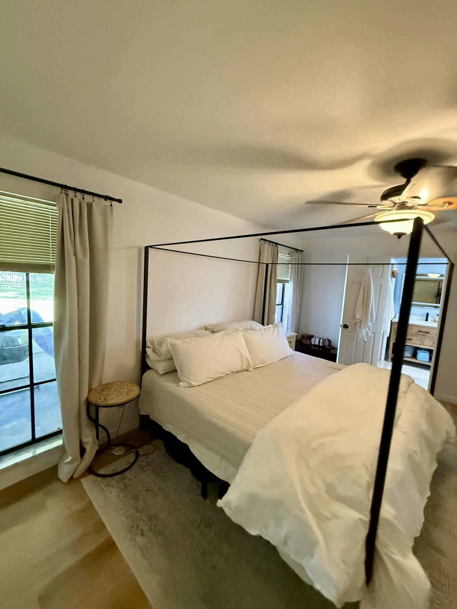 411 West Avenida Del Rio Clewiston, FL 33440 - Photo 15 of 29 a bedroom with a bed and a window