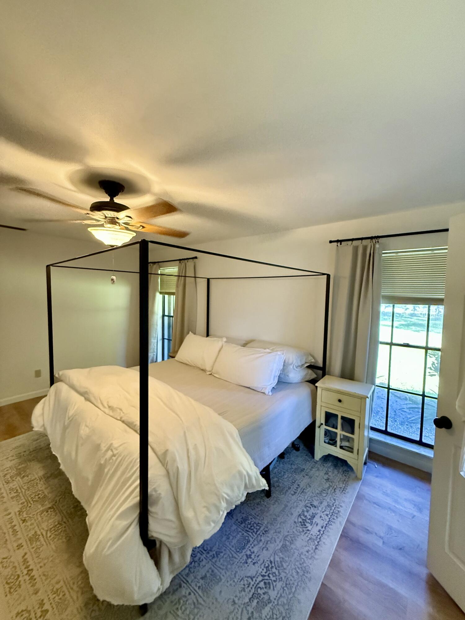 411 West Avenida Del Rio Clewiston, FL 33440 - Photo 16 of 29 a bedroom with a bed and a window