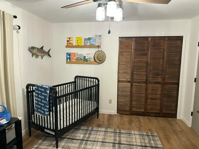 a view of entryway with wooden floor