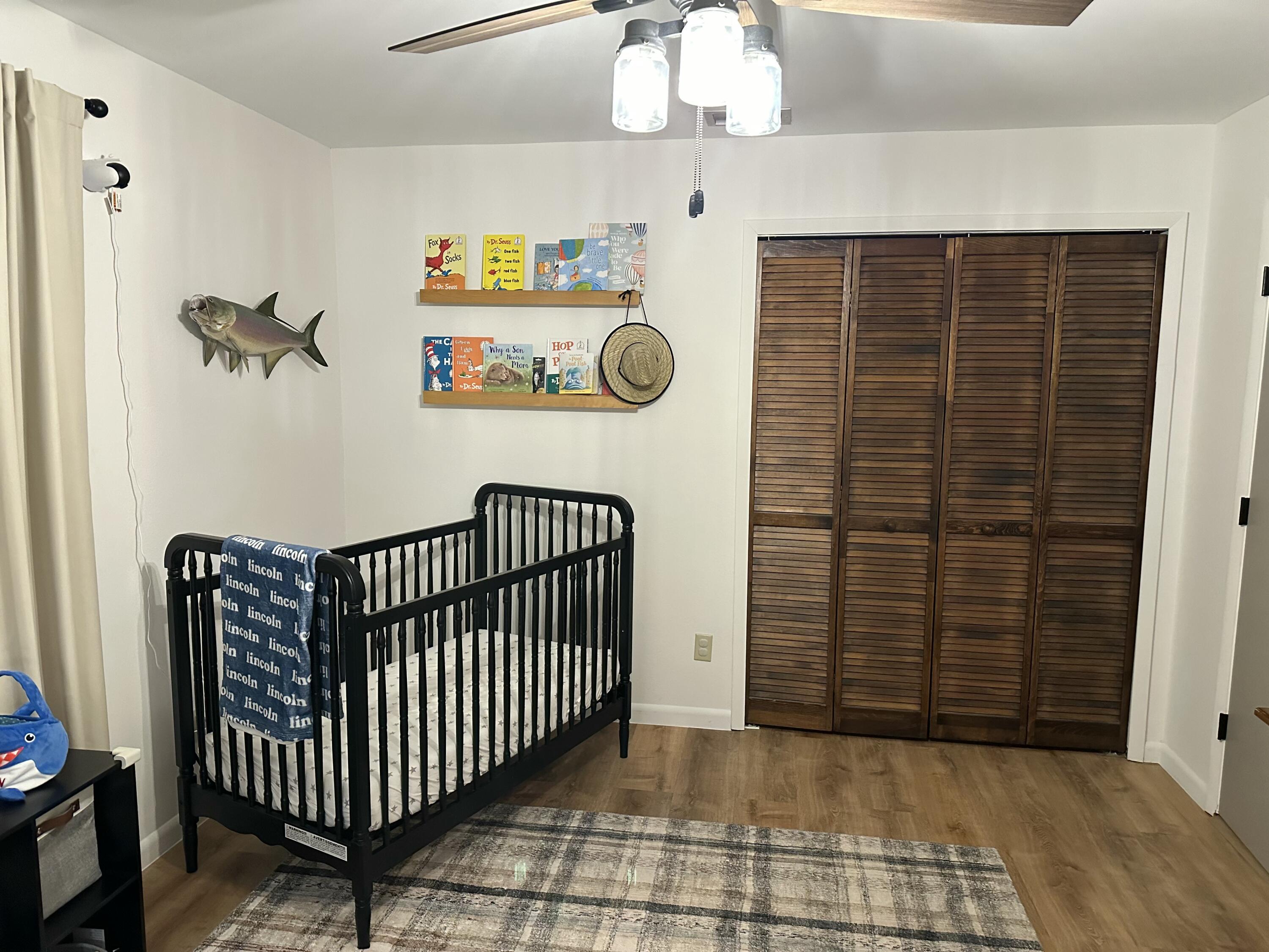 411 West Avenida Del Rio Clewiston, FL 33440 - Photo 19 of 29 a view of entryway with wooden floor