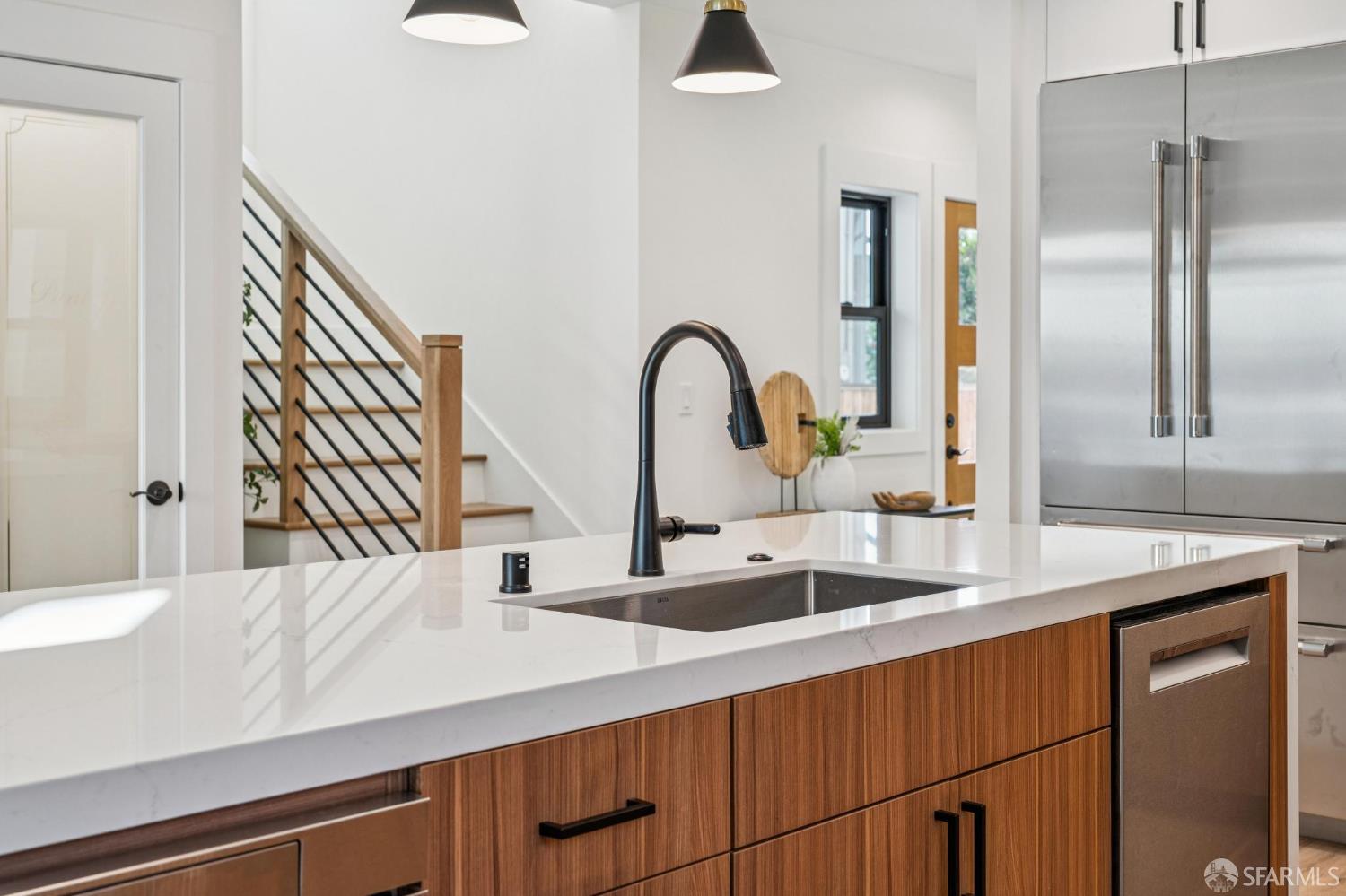 2411 Sixth Street Berkeley, CA 94710 - Photo 26 of 72 a kitchen with a sink and a refrigerator