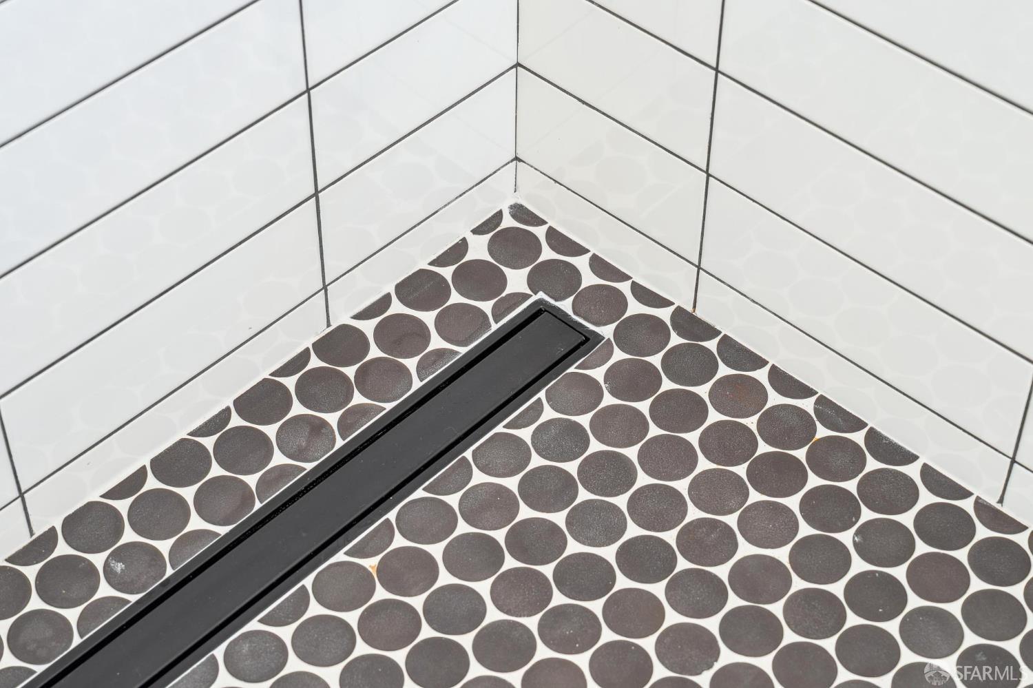 2411 Sixth Street Berkeley, CA 94710 - Photo 49 of 72 a view of a bathroom with a black and white checkered checkered floor