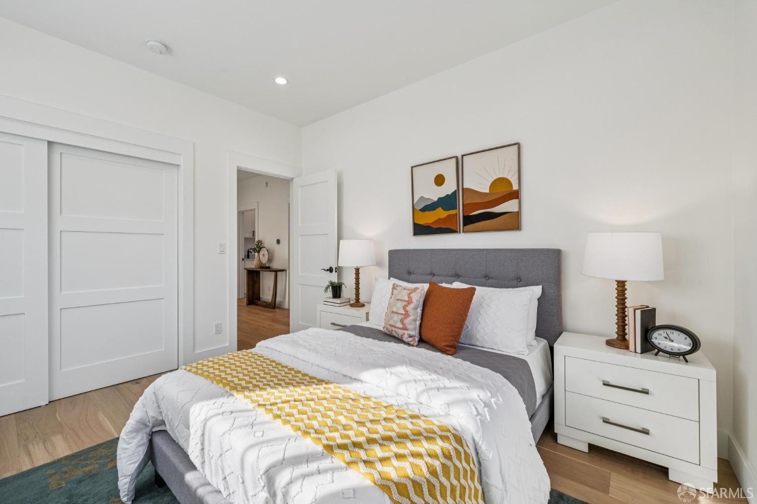 2411 Sixth Street Berkeley, CA 94710 - Photo 57 of 72 a bedroom with bed and wall painting