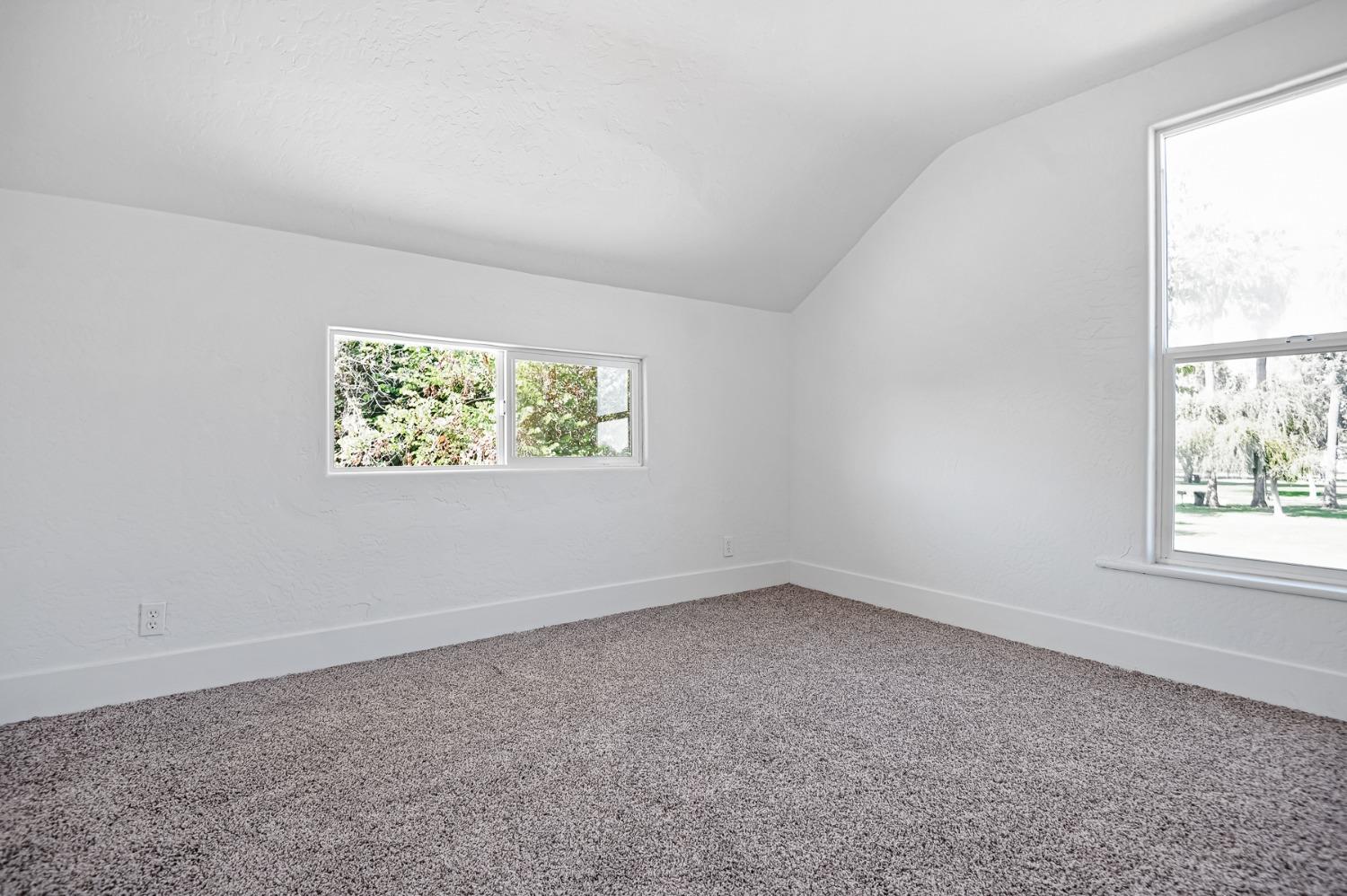 325 West Bush Street Lemoore, CA 93245 - Photo 45 of 55 an empty room with a window