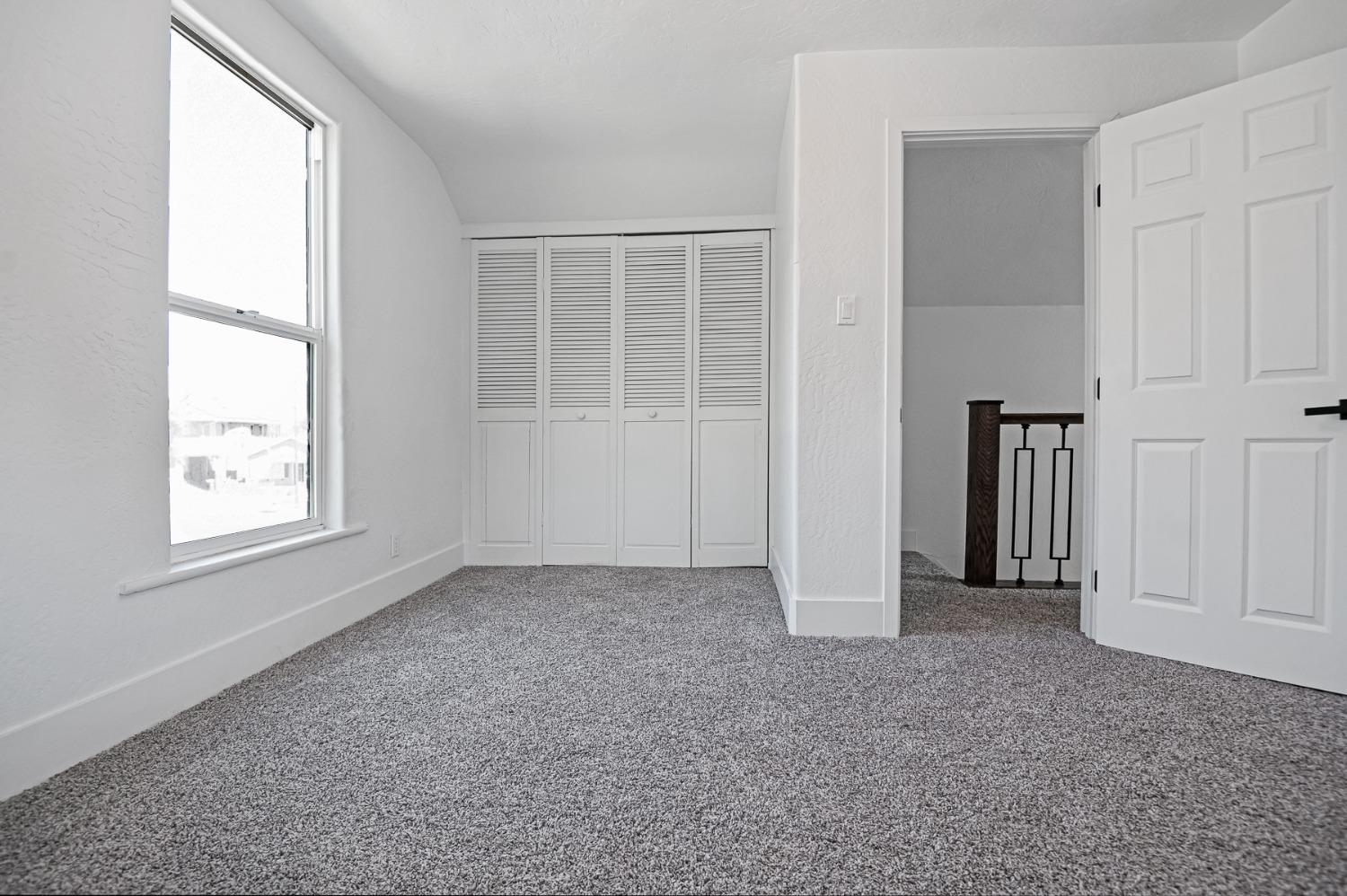 325 West Bush Street Lemoore, CA 93245 - Photo 46 of 55 an empty room with windows