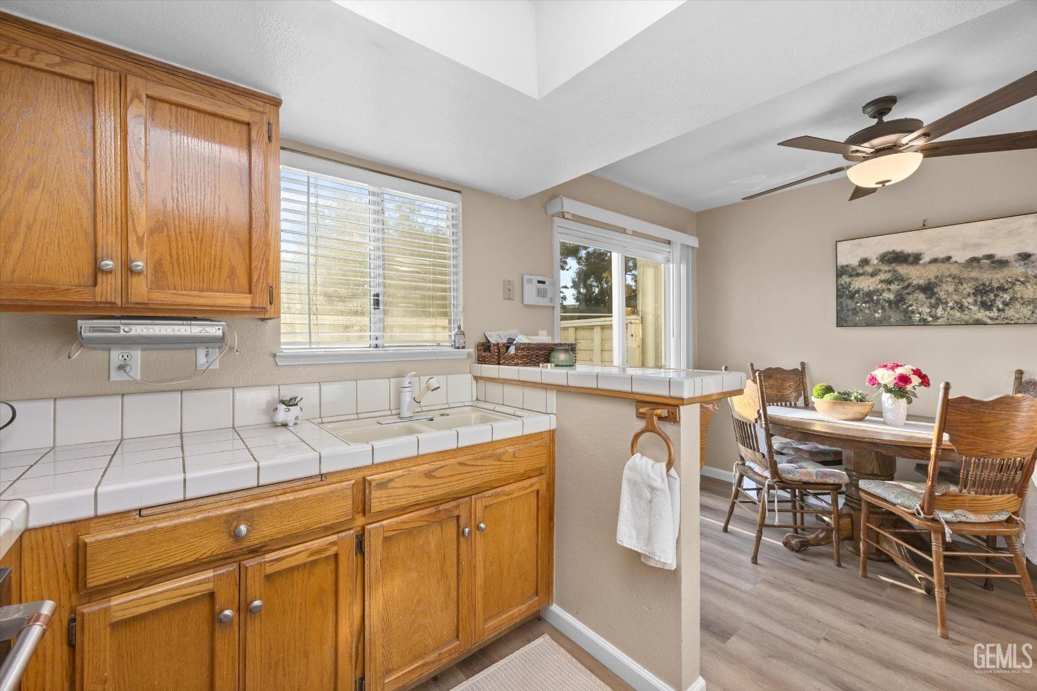 Undisclosed Address Bakersfield, CA 93311 - Photo 15 of 30 a view of a kitchen counter space and windows