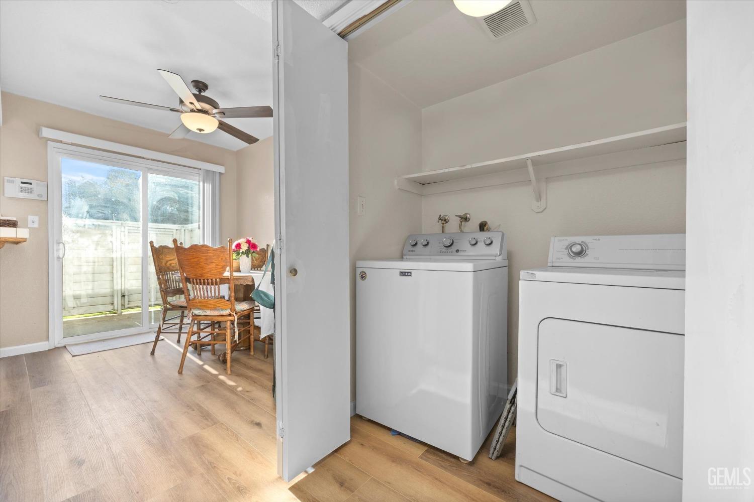 Undisclosed Address Bakersfield, CA 93311 - Photo 21 of 30 a view of a dining room with furniture window and wooden floor