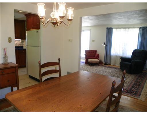 47 Dover Road Irwin, PA 15642 - Photo 5 of 18 Dining Room. The living room opens to the formal dining room through a large doorway. Note the beautiful hardwood floors, found throughout the home.