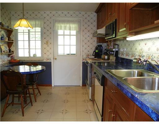 47 Dover Road Irwin, PA 15642 - Photo 7 of 18 Kitchen. A breakfast "peninsula" provides the perfect spot to enjoy your morning coffee.