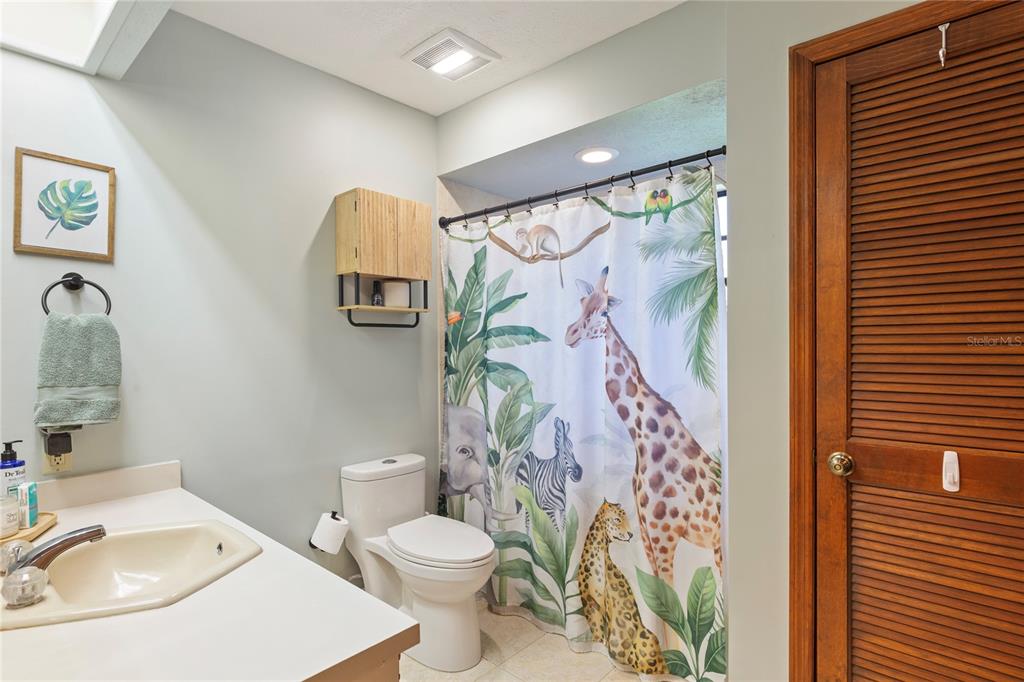 2941 Chelsea Woods Drive Valrico, FL 33596 - Photo 27 of 48 a bathroom with a sink toilet and shower