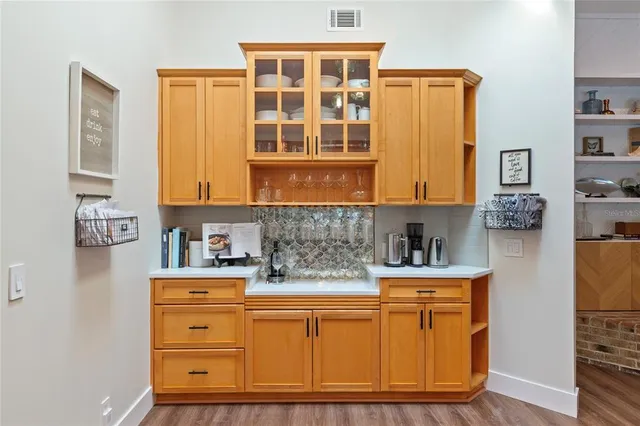 a kitchen with stainless steel appliances granite countertop a stove and a refrigerator
