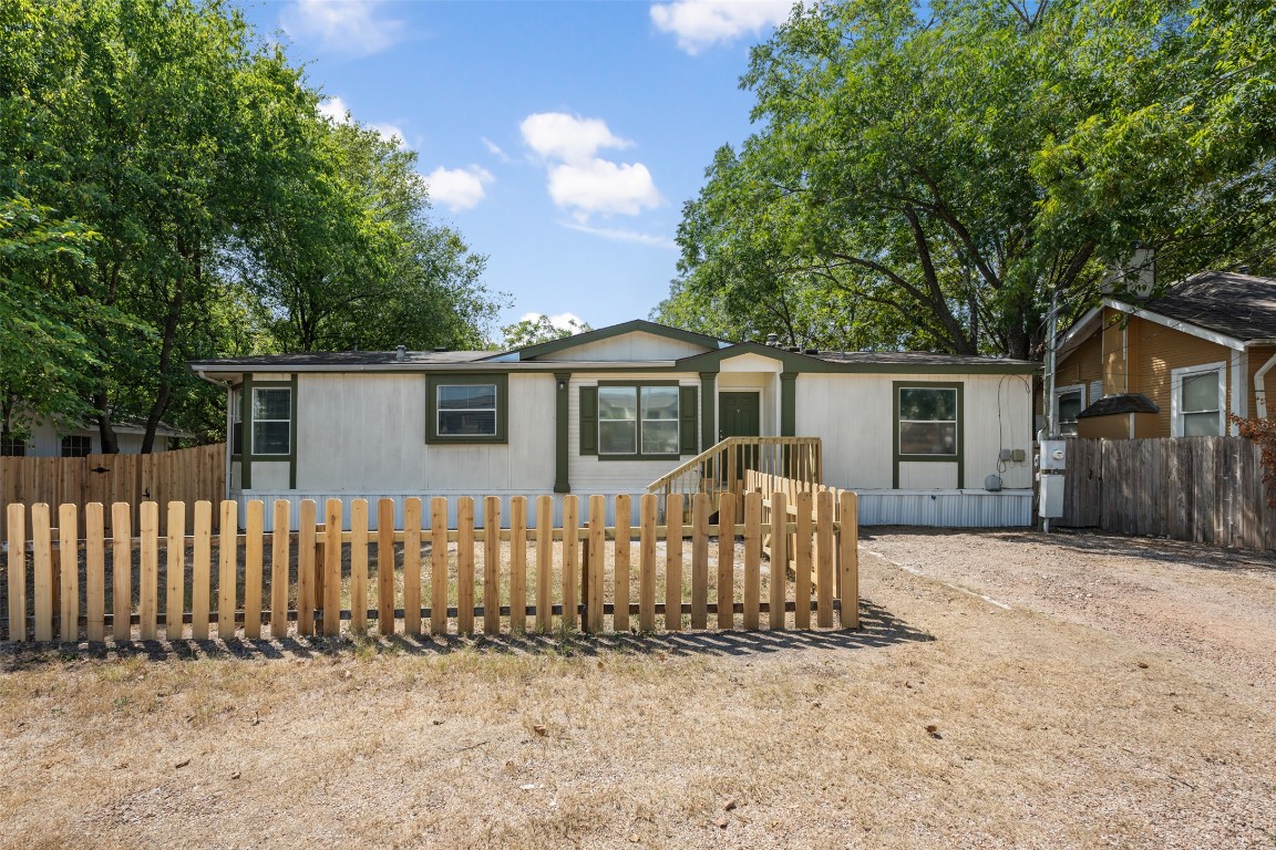 635 West Dittmar Road Austin, TX 78748 - Photo 2 of 32 front view of a house with a fence