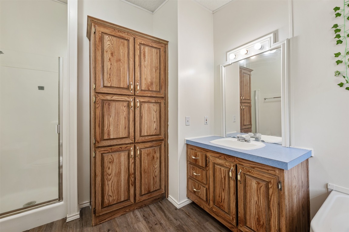 635 West Dittmar Road Austin, TX 78748 - Photo 22 of 32 a bathroom with a sink and a mirror