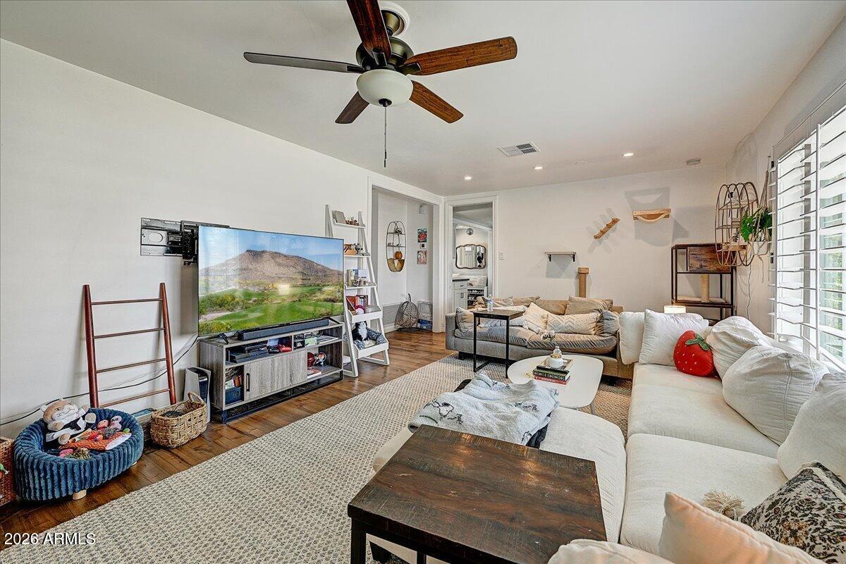607 West 15th Street Tempe, AZ 85281 - Photo 15 of 29 a living room with furniture and a flat screen tv