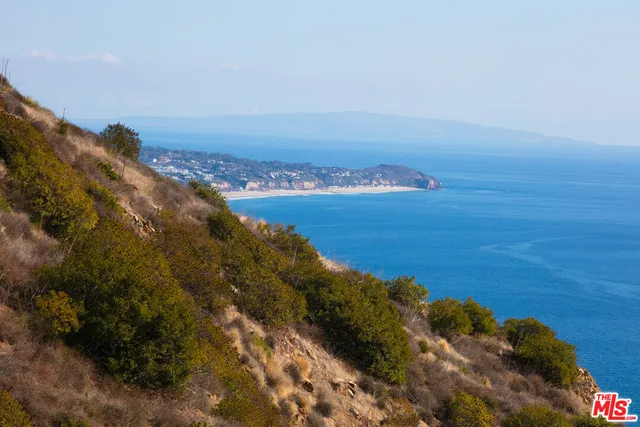 a view of lake and mountain