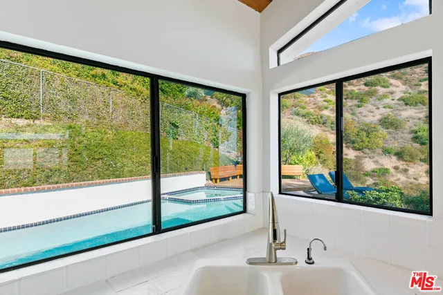 a bathroom with a large window