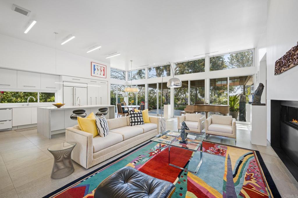 13260 Mango Drive Del Mar, CA 92014 - Photo 7 of 46 a living room with furniture fireplace and a table