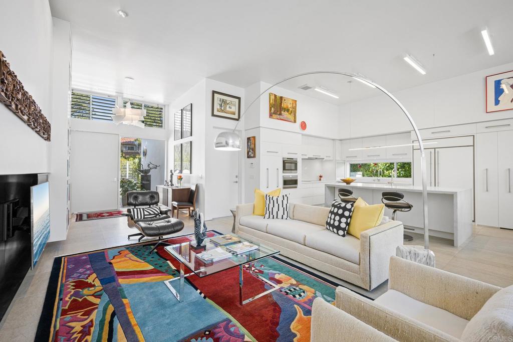 13260 Mango Drive Del Mar, CA 92014 - Photo 9 of 46 a living room with patio furniture and a rug