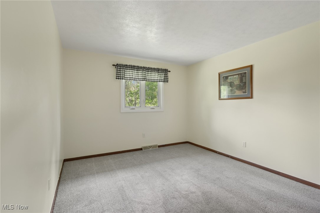 5845 Carsten Road Medina, OH 44256 - Photo 29 of 37 View of carpeted spare room