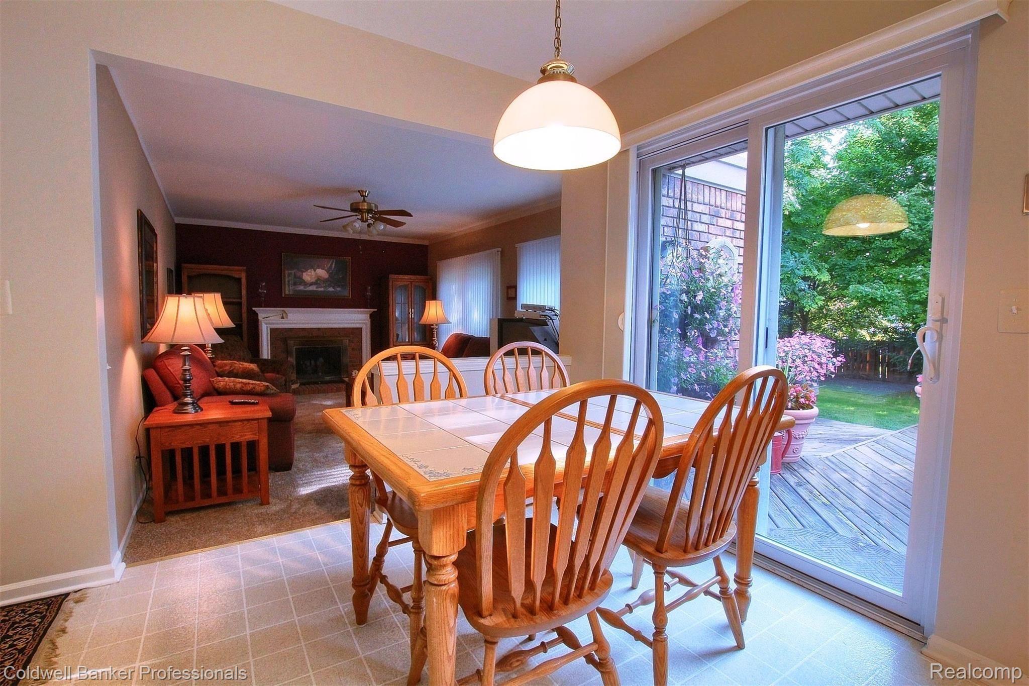 6742 Carlton Road Canton, MI 48187 - Photo 14 of 38 Breakfast nook with doorwall to deck