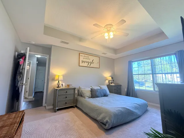 a bathroom with a sink a toilet and vanity