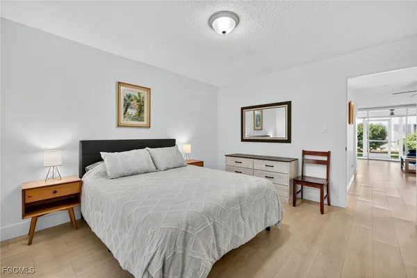 a large white bed in a white room