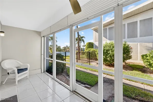 a view of a backyard with potted plants