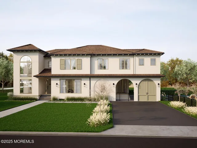 a front view of a house with a garden and plants